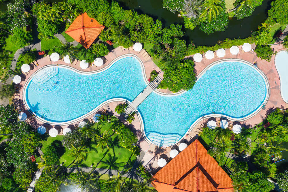 aerial-view-at-the-pool-and-palm-trees-a-place-fo-v2-5UDFQWH.jpg